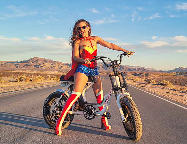 a lady riding addmotor cruiser m-66 r7