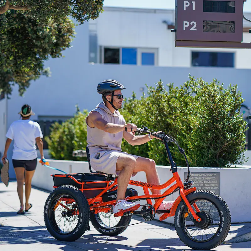 World-first Semi-Recumbent Electric Trike In Orange