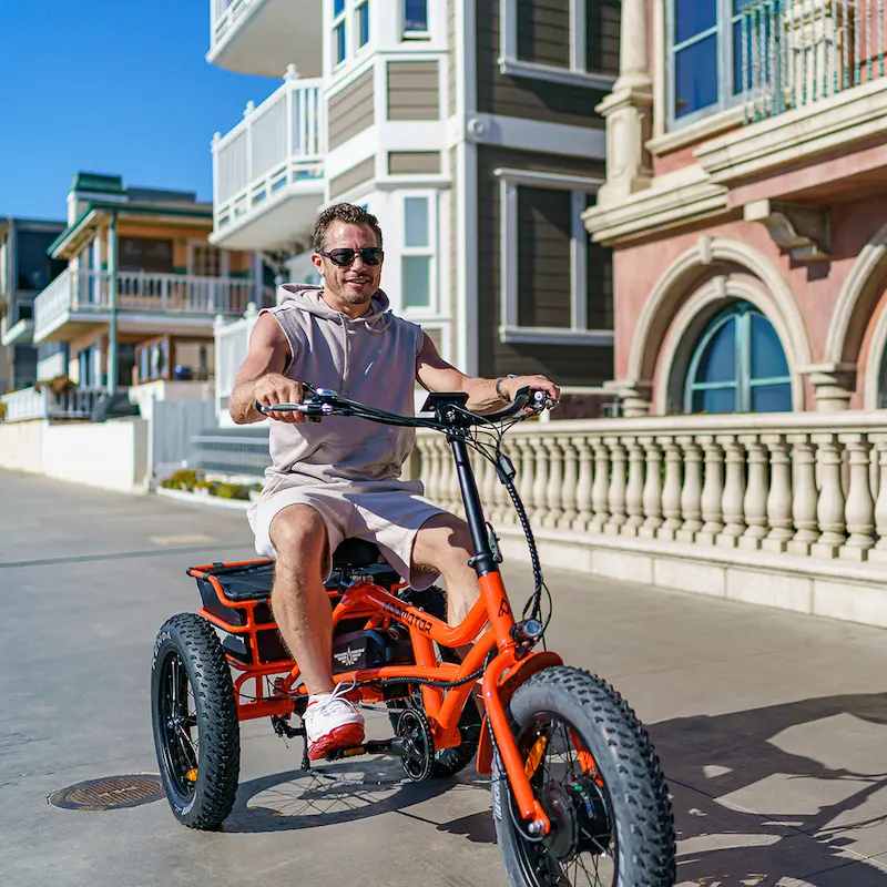 World-first Semi-Recumbent M-360 Electric Trike In Orange