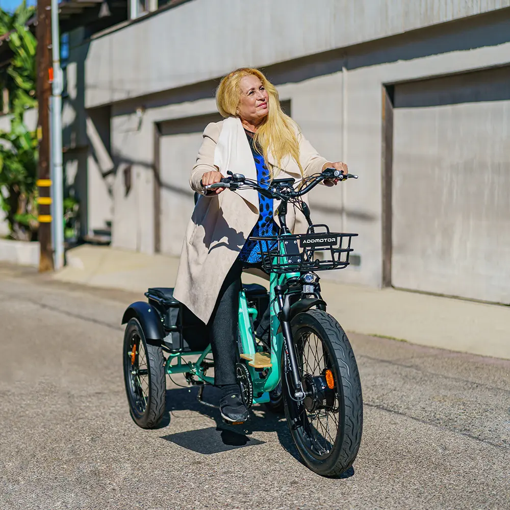 a woman is riding addmotor etrike