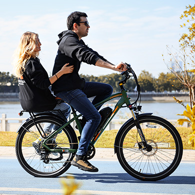 a couple commuting on the Citypro 125+miles ebike 