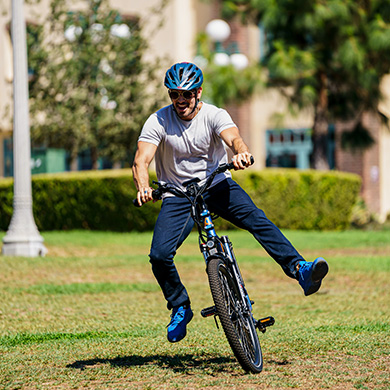 a young man commutes on Citypro ebike 