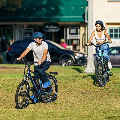 a young couple having fun on their citypro ebike 