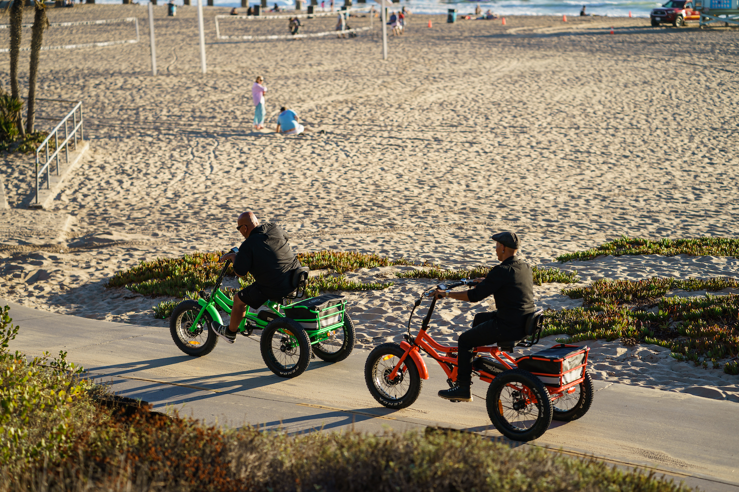 m-360 semi-recumbent fat tire electric trike for adults in Orange and Green