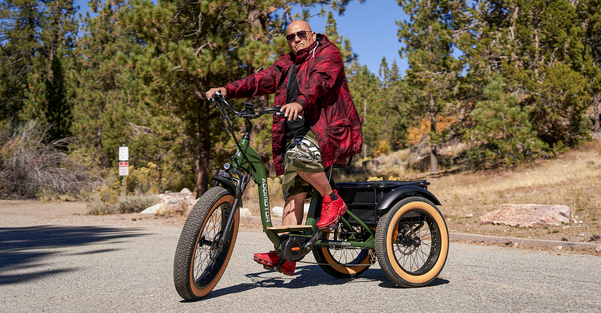 a man is riding grandtan turbo e-trike