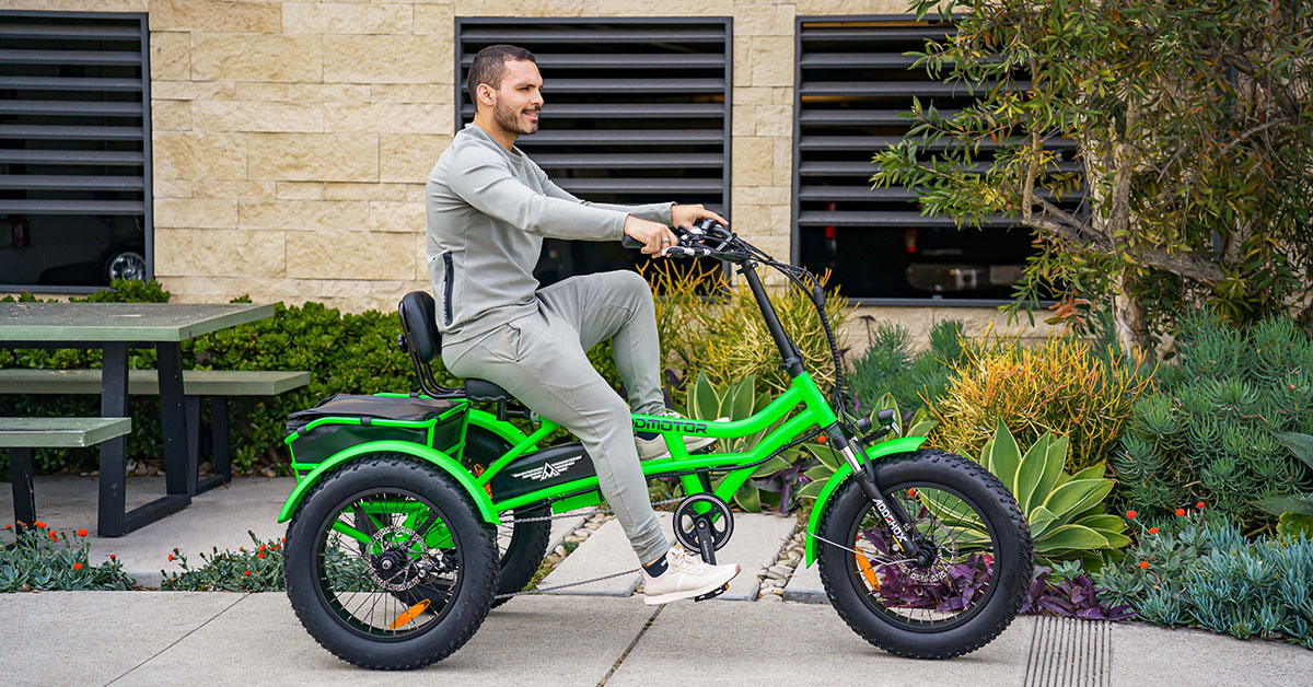a man riding a semi recumbent electric trike