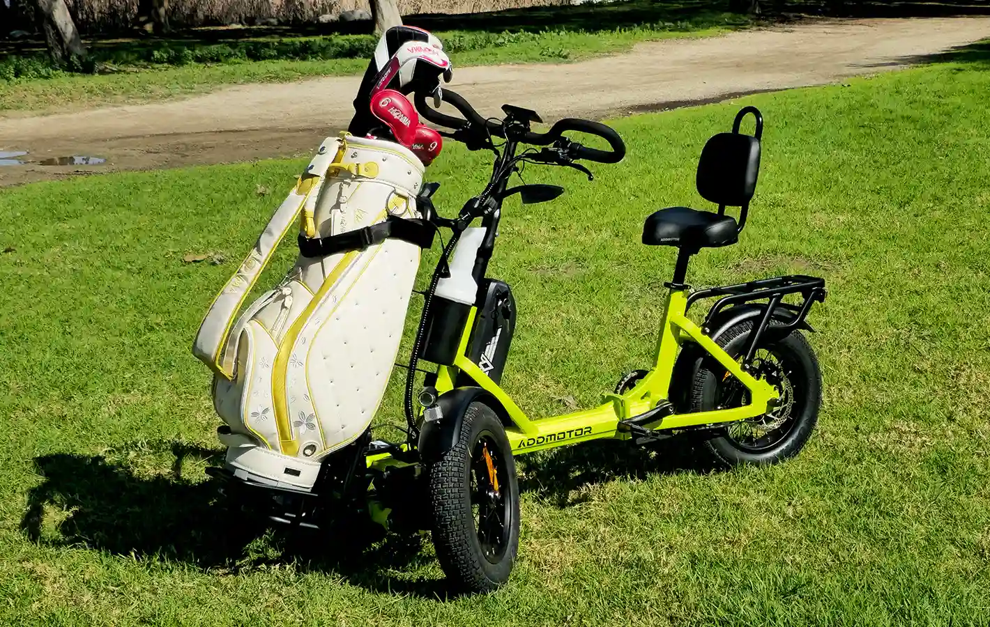 SpytanX electric trike is sitting on the golf course
