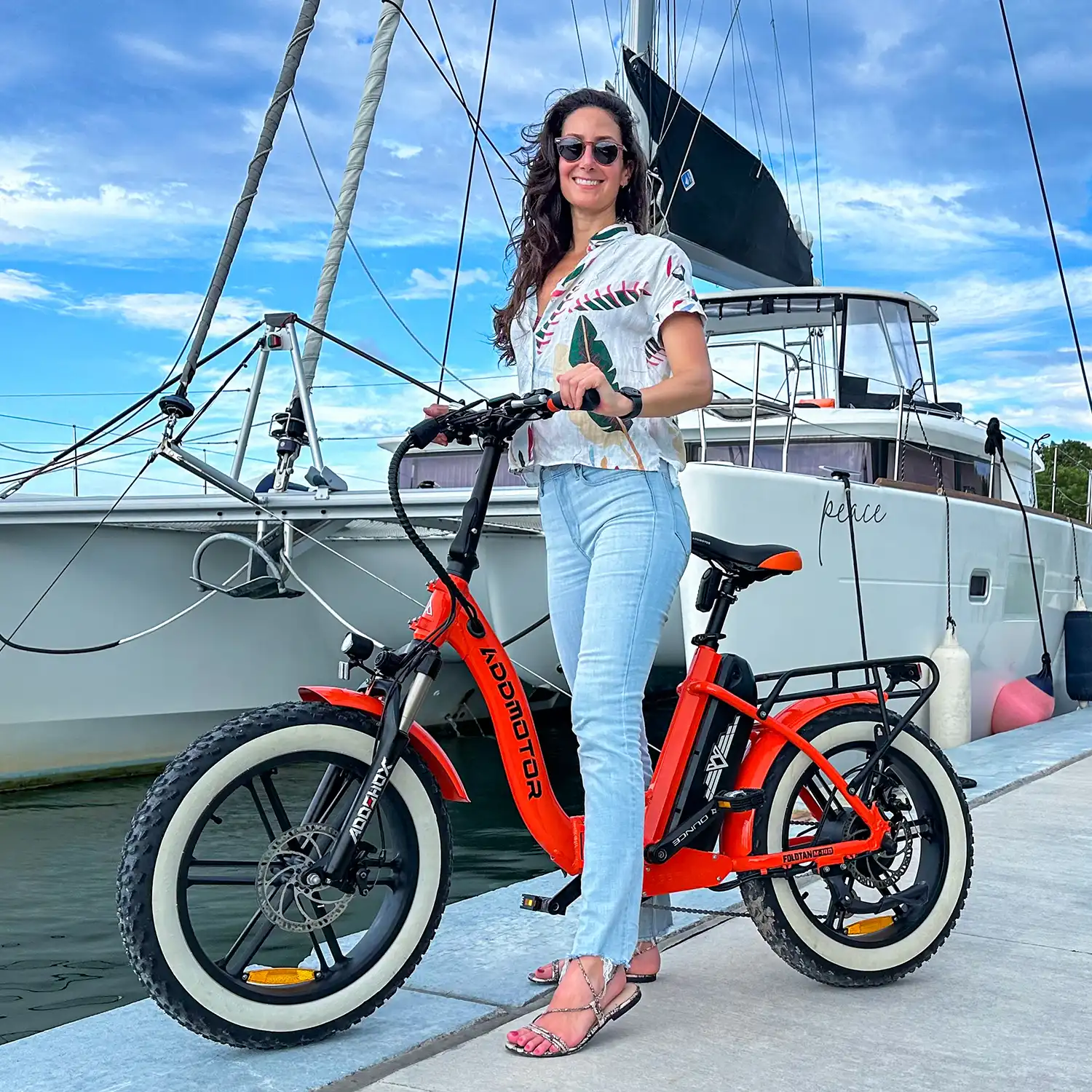 Addmotor M-140 in front of a yacht