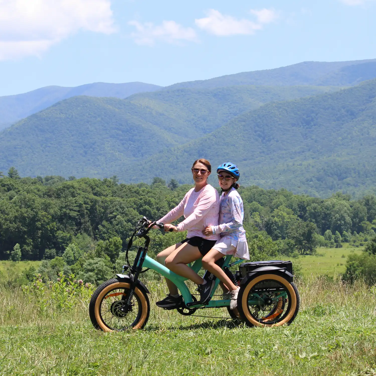 Mom and daughter riding Addmotor M-365X outdoor