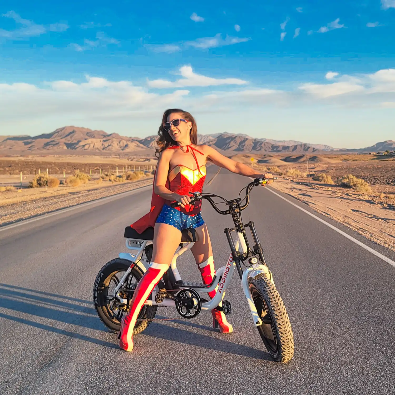 a woman in costum is happily riding Addmotor ebike