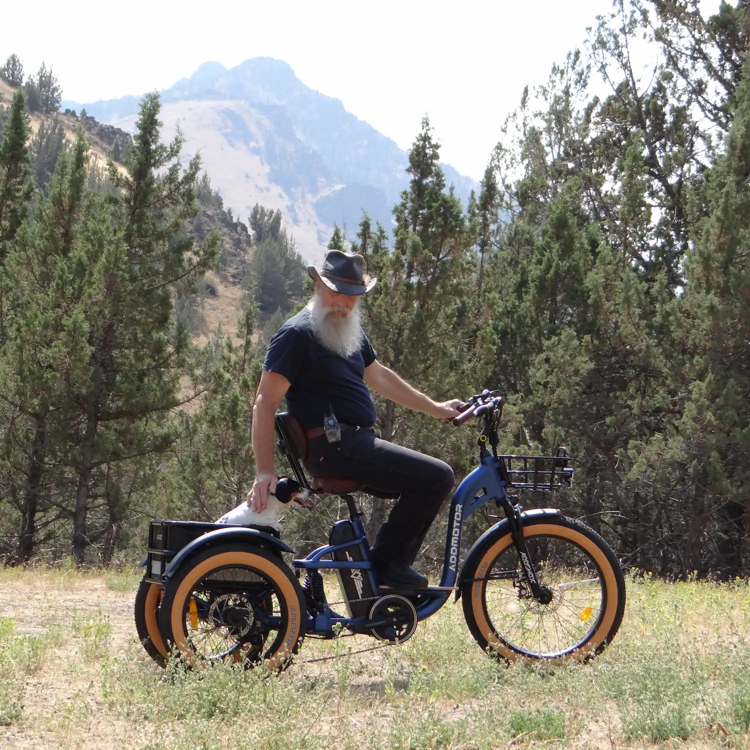 A man is riding Addmotor GRANDTAN outdoor happily