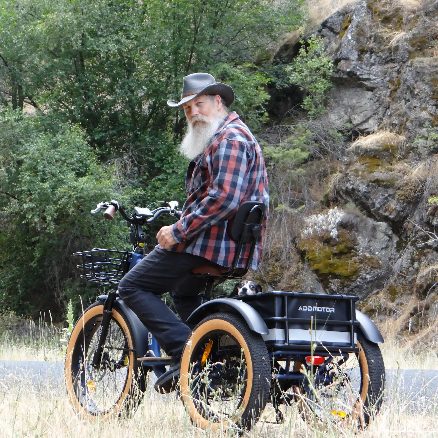 A man is riding Addmotor Grandtan Etrike