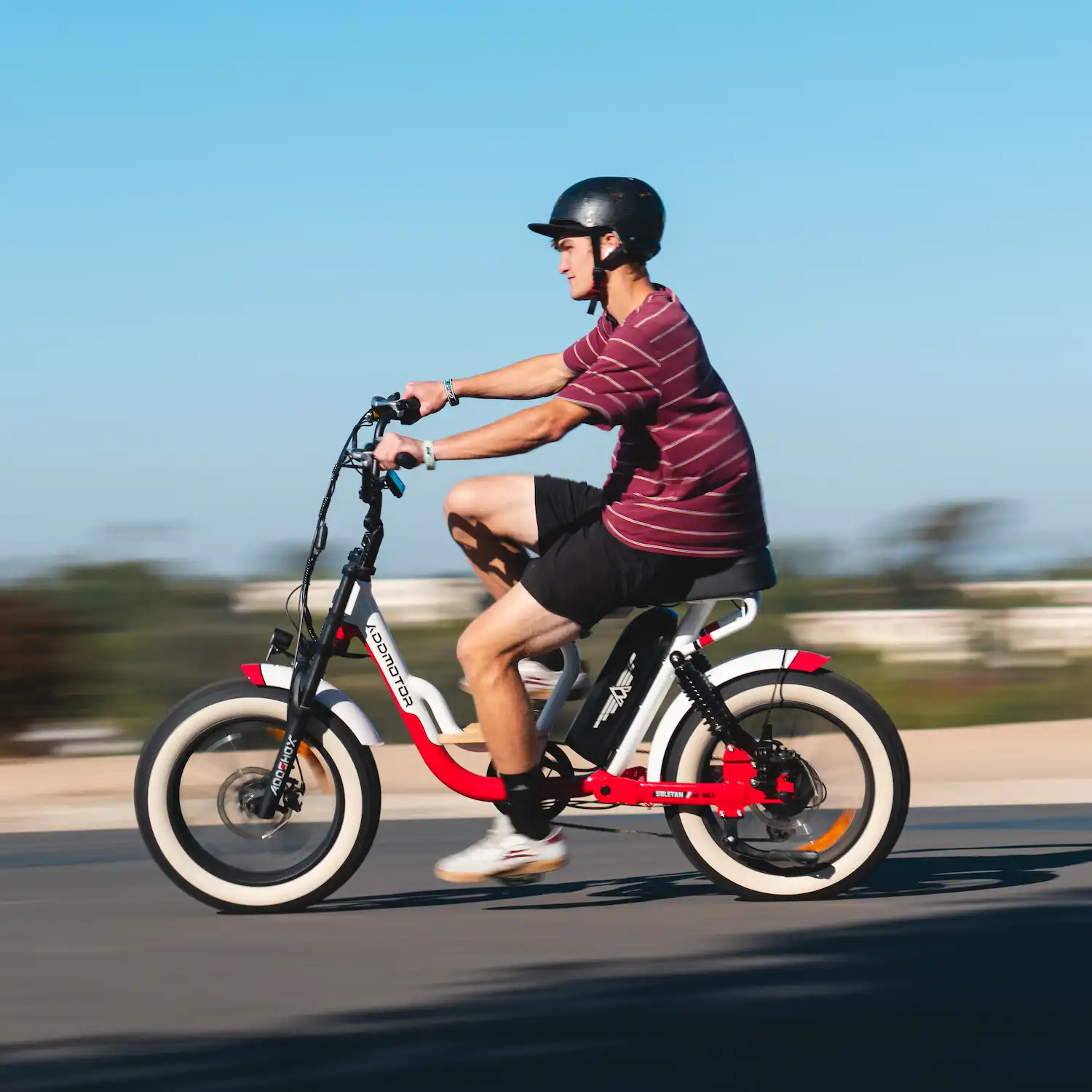 A guy is riding Addmotor M-66X